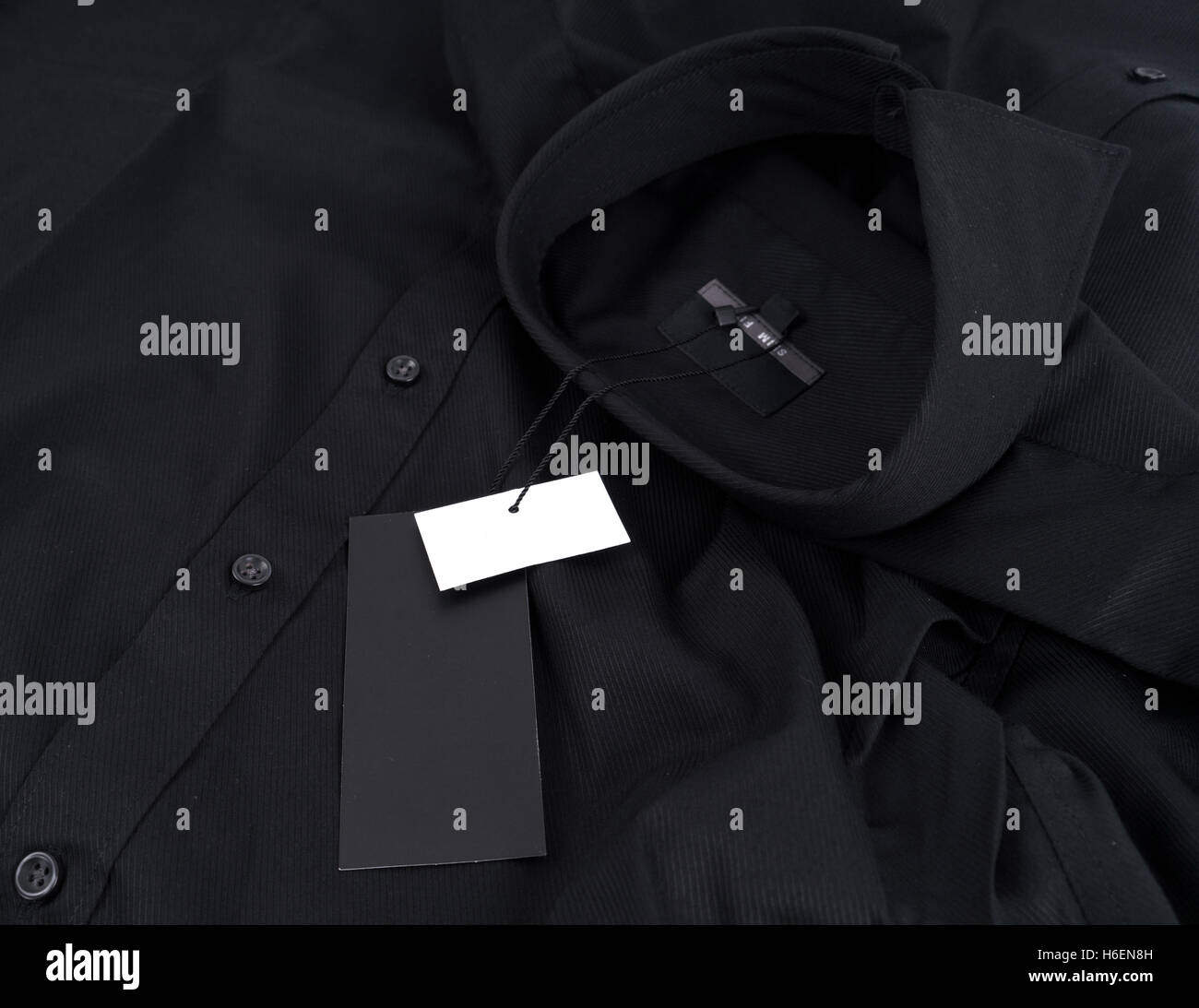 Male in black shirt hi-res stock photography and images - Alamy