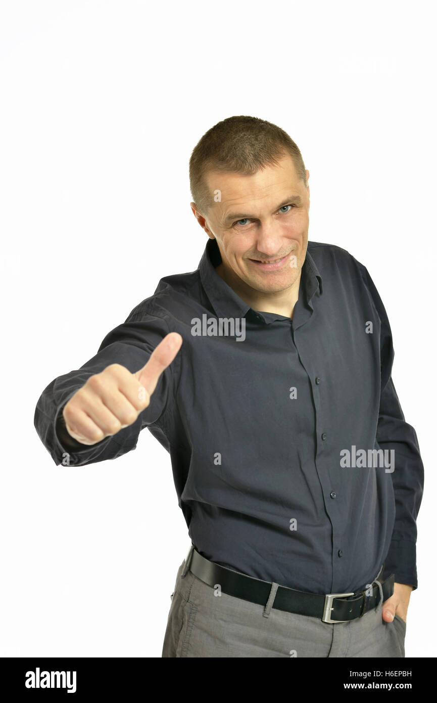 portrait of a smiling man looking at camera with confidence, is Stock Photo