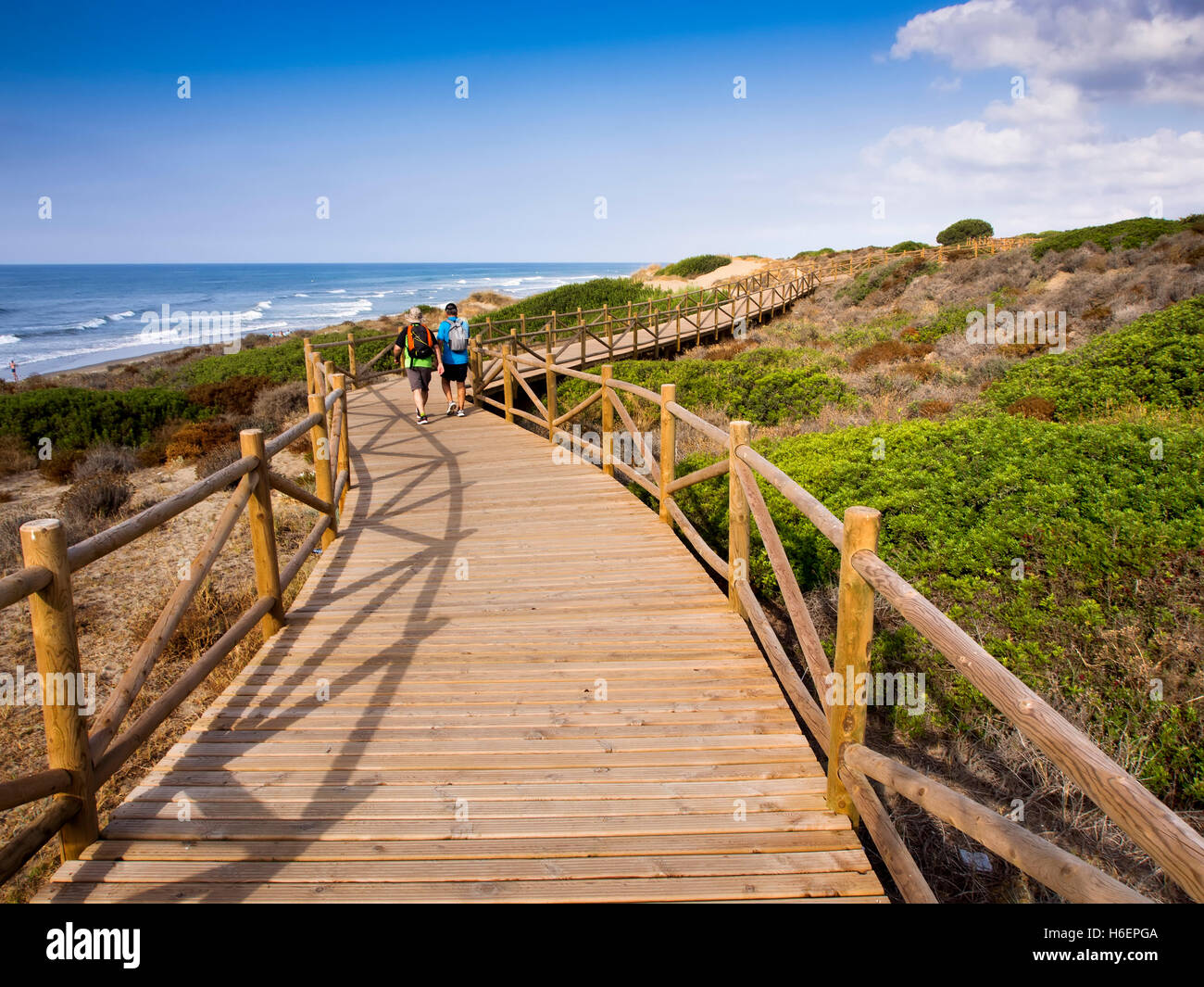 Wooden path in the natural park of Cabopino, Marbella. Costa del Sol Stock  Photo - Alamy