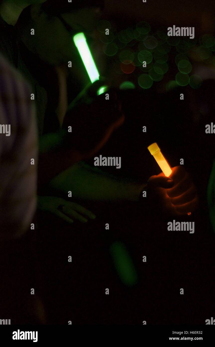 people waving glow sticks during Leonard Cohen's concert in Israel, September 24, 2009 Stock Photo