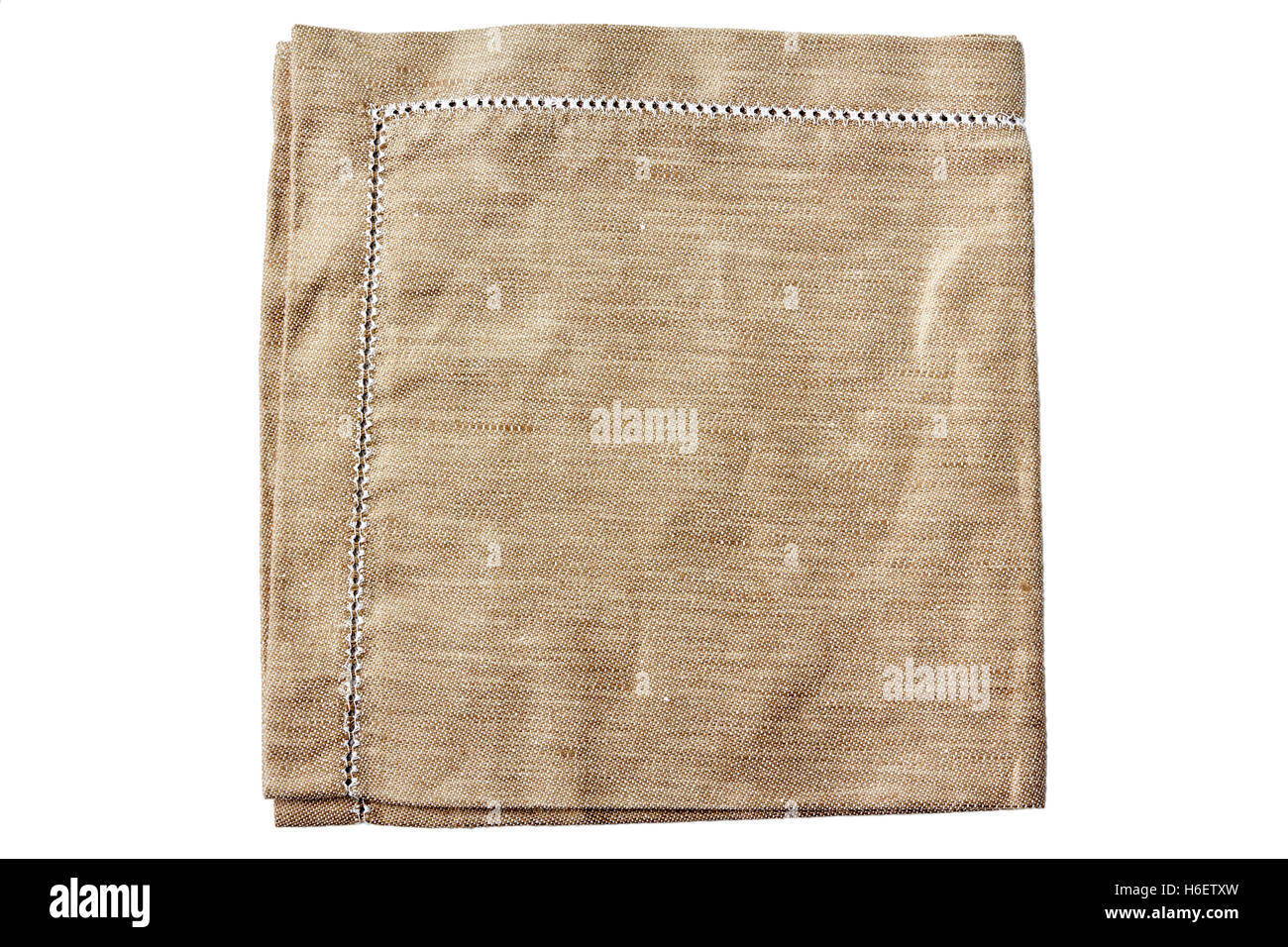 Beige fabric napkin on white Stock Photo