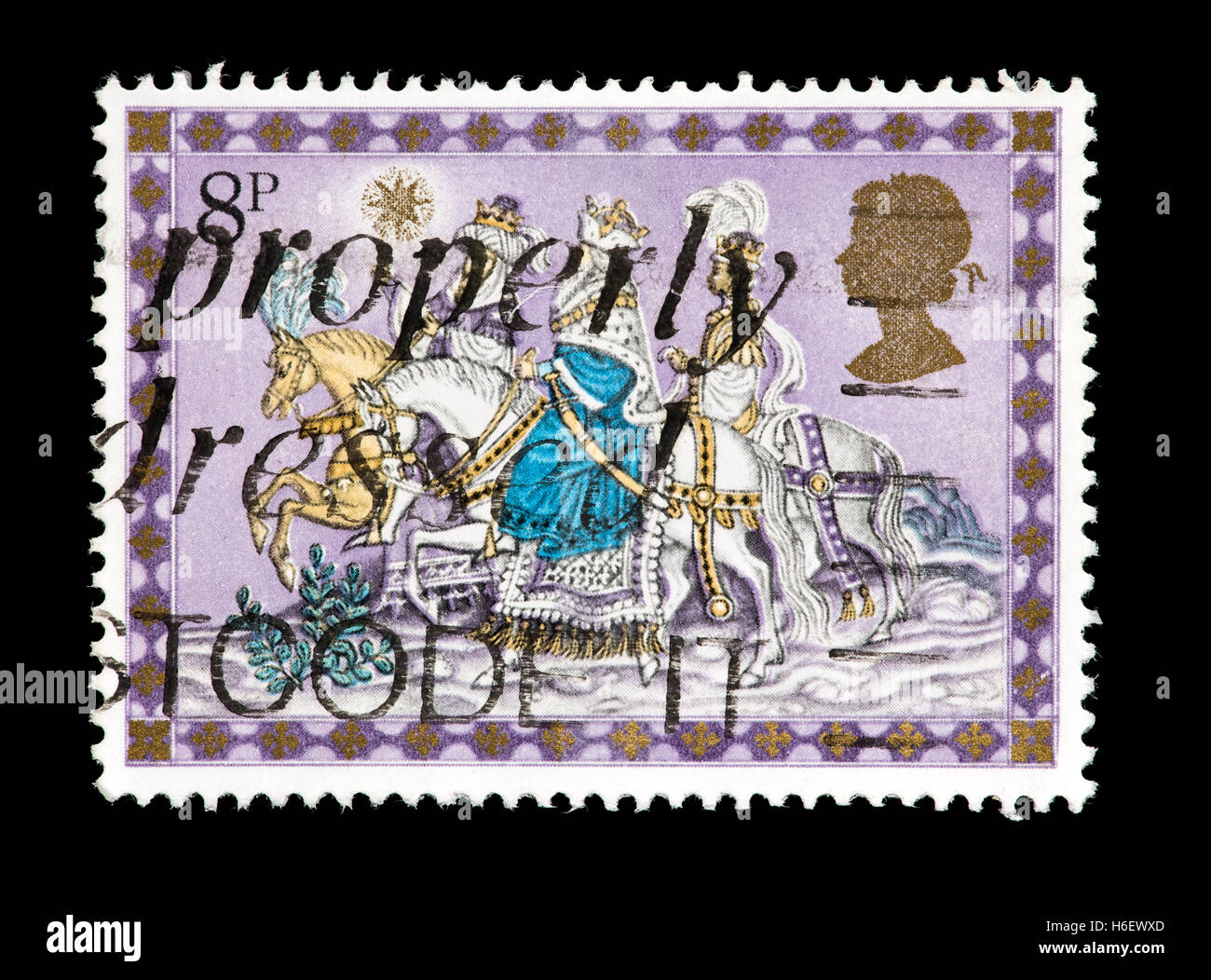 Postage stamp from Great Britain depicting the three kings following star, Christmas issue. Stock Photo