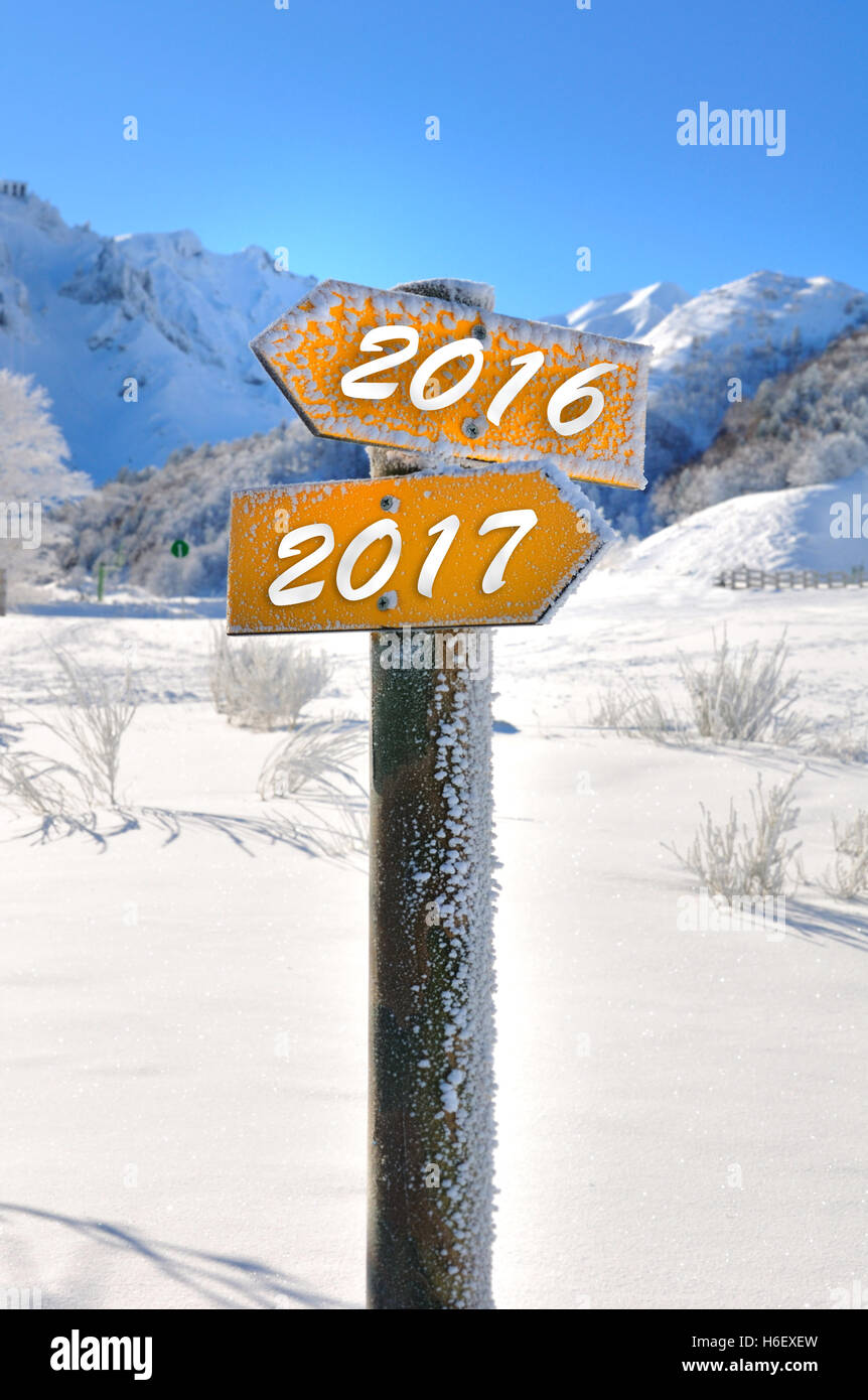 2016 and 2017 on two panels mountain overlooking the opposite direction Stock Photo