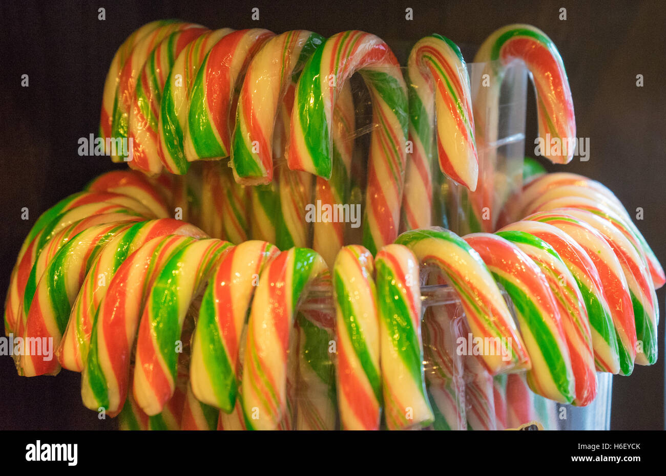 Brightly coloured candy canes in a jar Stock Photo Alamy