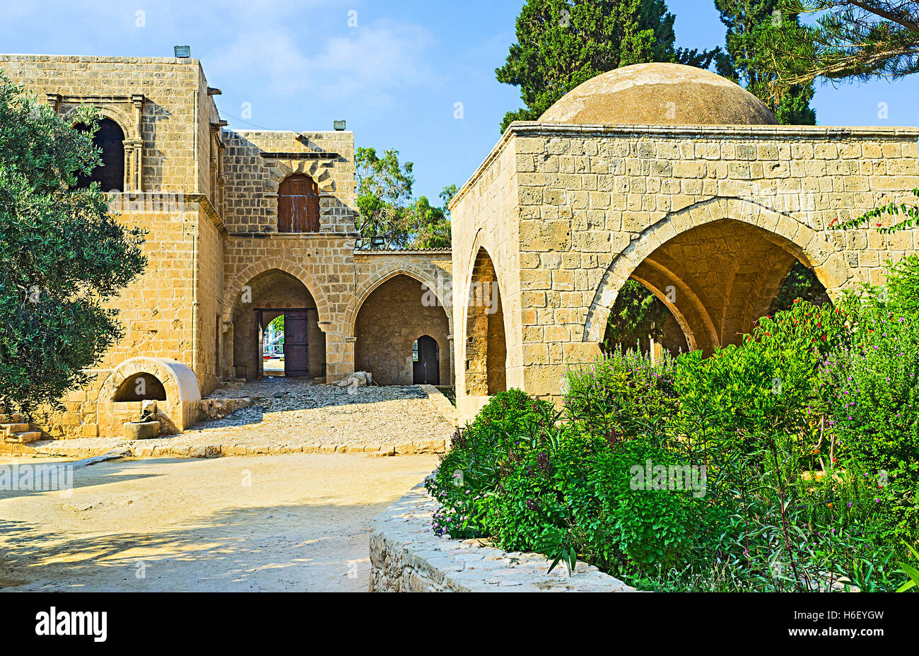 the-garden-of-ayia-napa-monastery-surrounded-by-massive-medieval