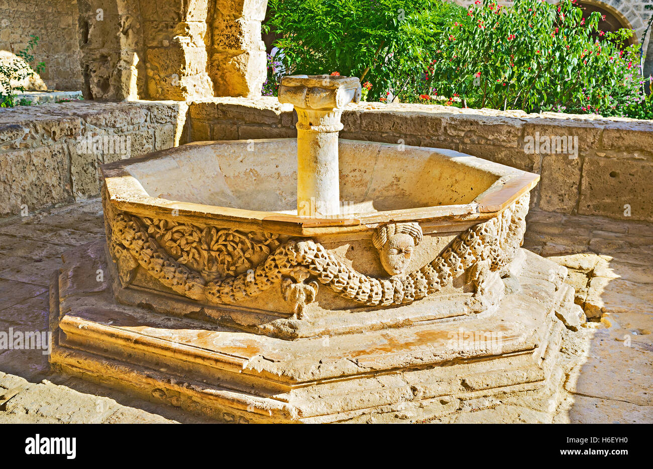 The medieval fountain decorated with the stone sculptures located in