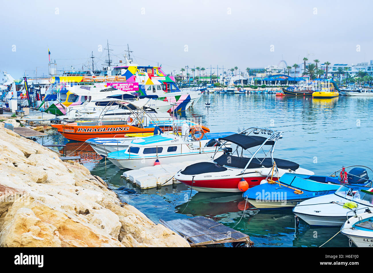 The main harbor of resort is full of the small fishing boats, tourist