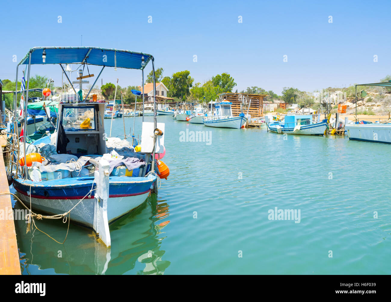 The fishing village of Liopetri with many old boats, moored on the river banks, Cyprus. Stock Photo