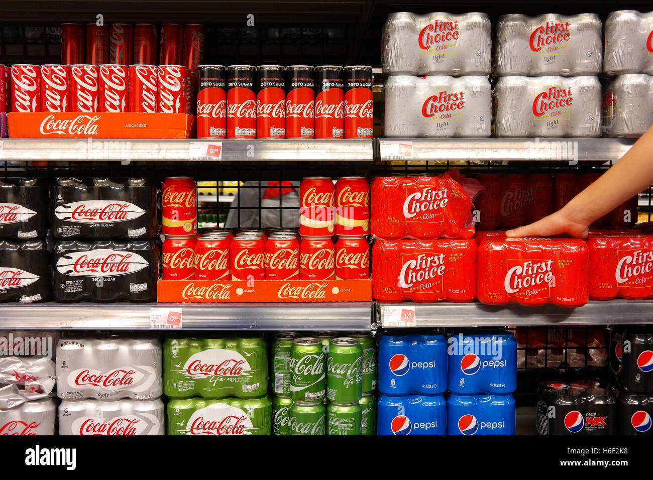 Various Brands of Cola in a Store Stock Photo