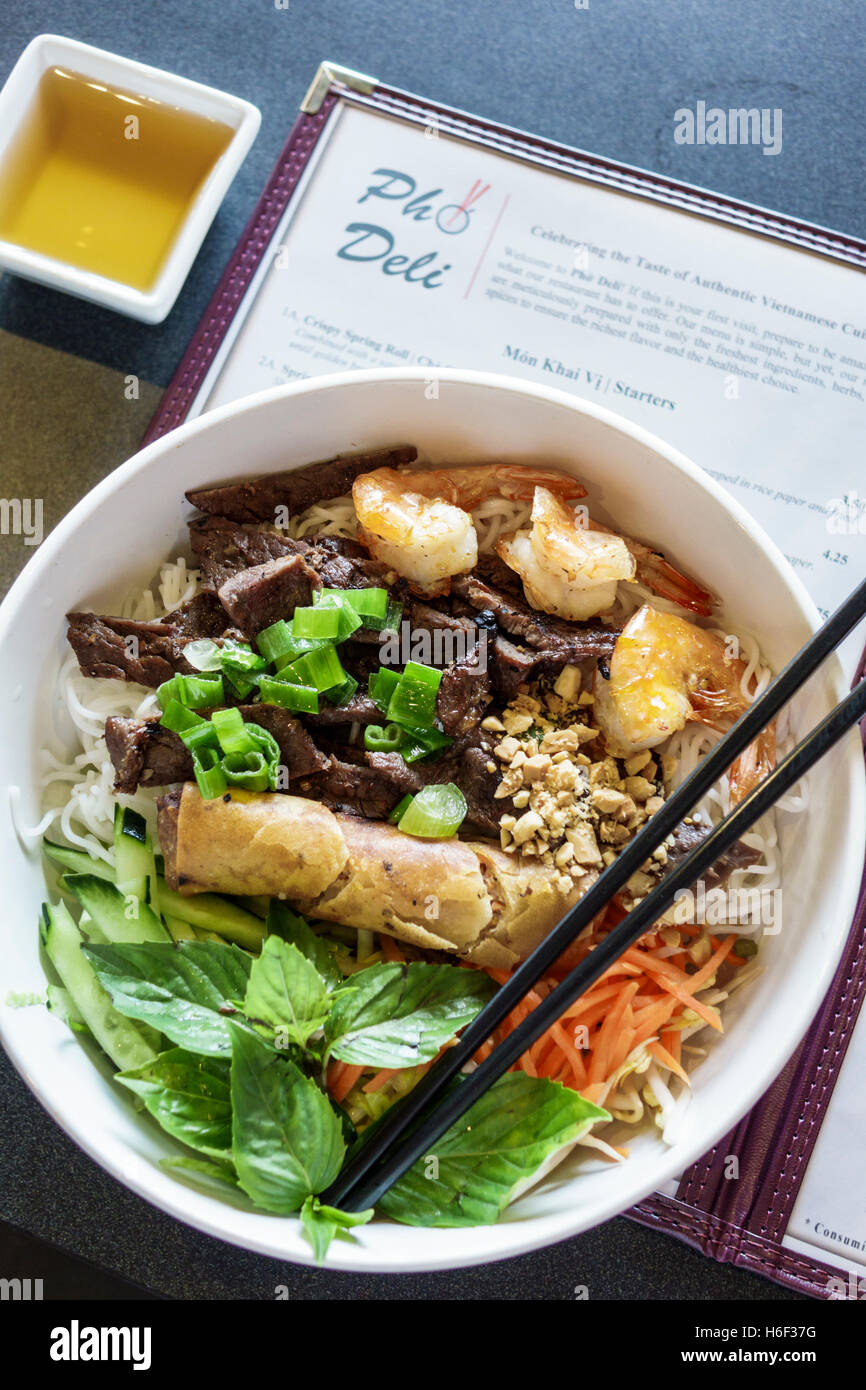 St. Saint Lucie Florida,Pho Deli,restaurant restaurants food dining cafe cafes,Vietnamese,interior inside,bowl,food,bun grilled beef,chopsticks,FL1608 Stock Photo