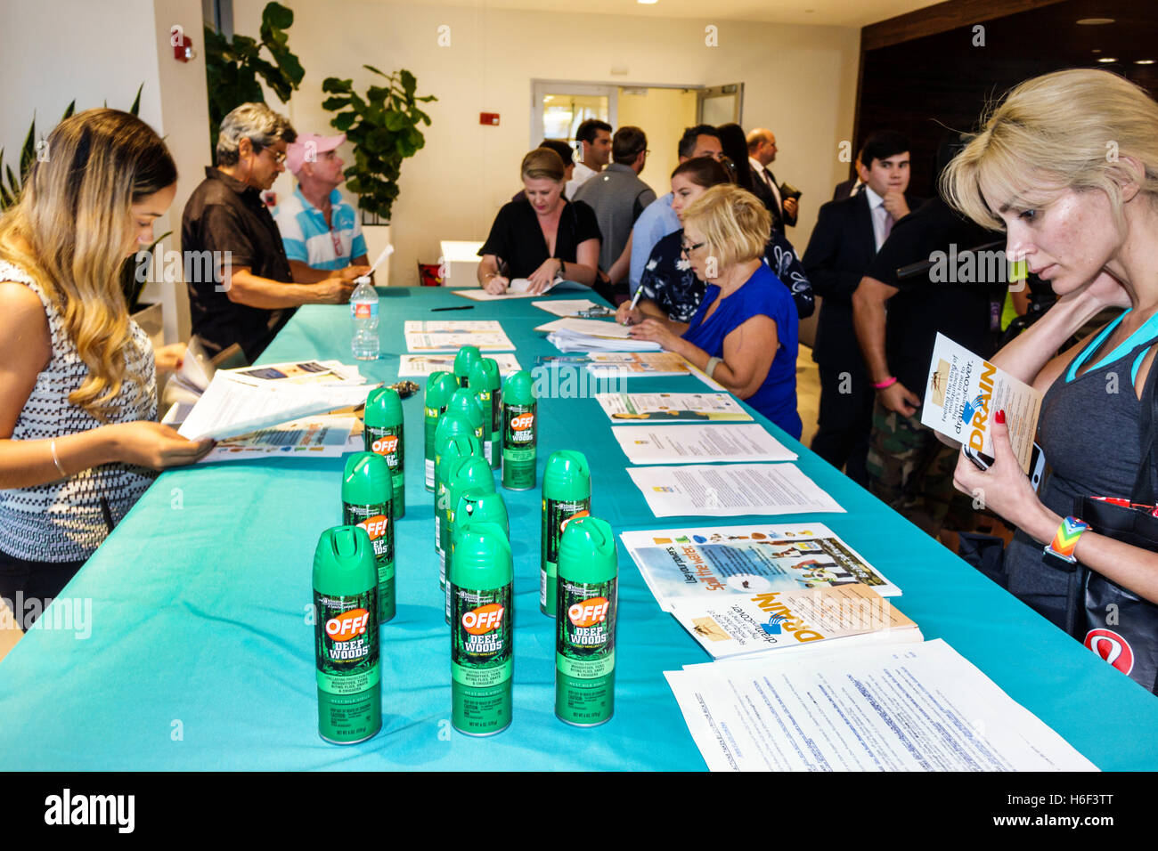 Miami Beach Florida,Waverly Condominiums,Zika Virus Town Hall Meeting,free mosquito spray,OFF!,information,literature,advice,adult adults,woman female Stock Photo