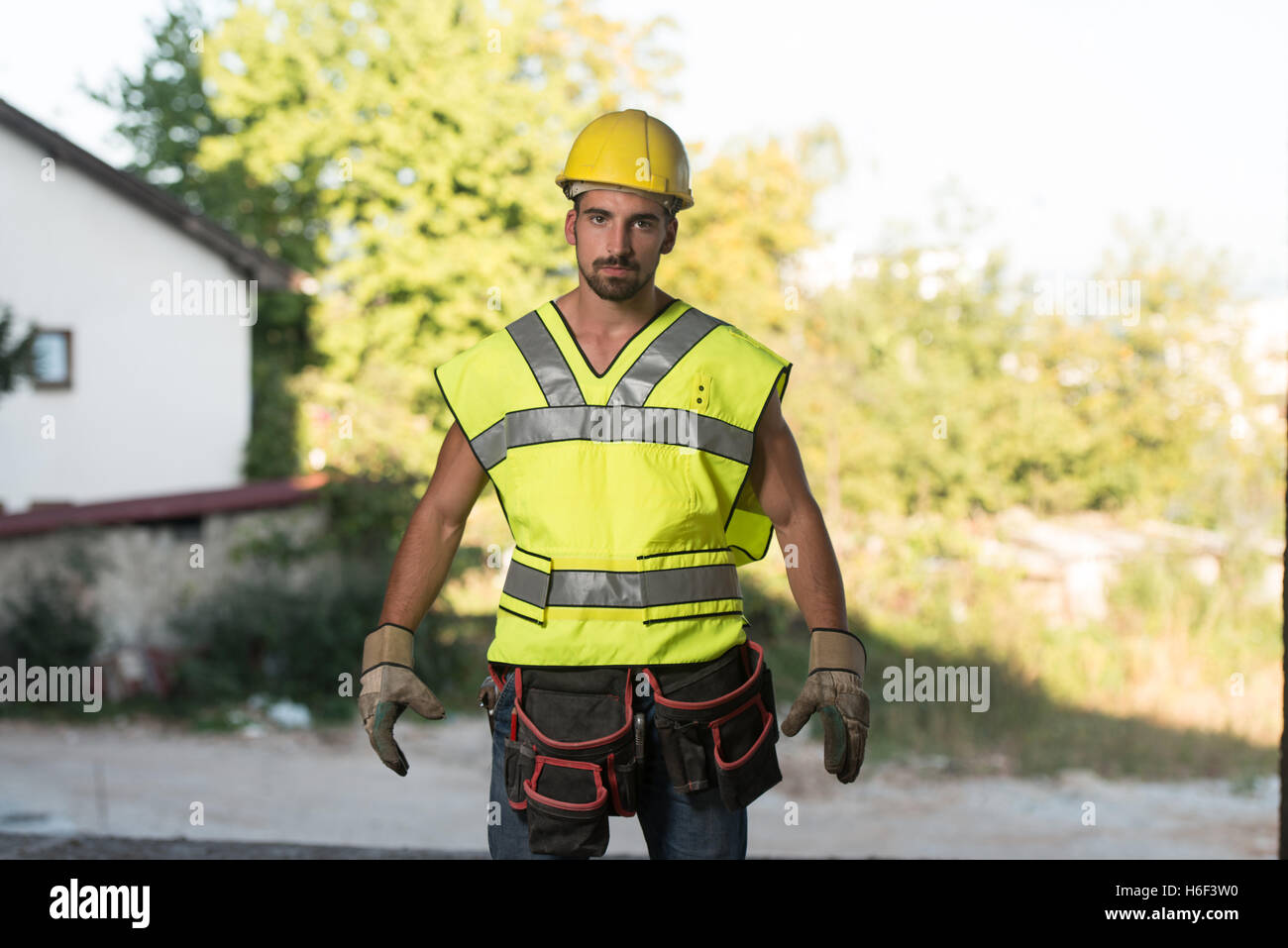 Portrait Of Handsome Male Architect Engineer With Yellow Helmet Stock ...