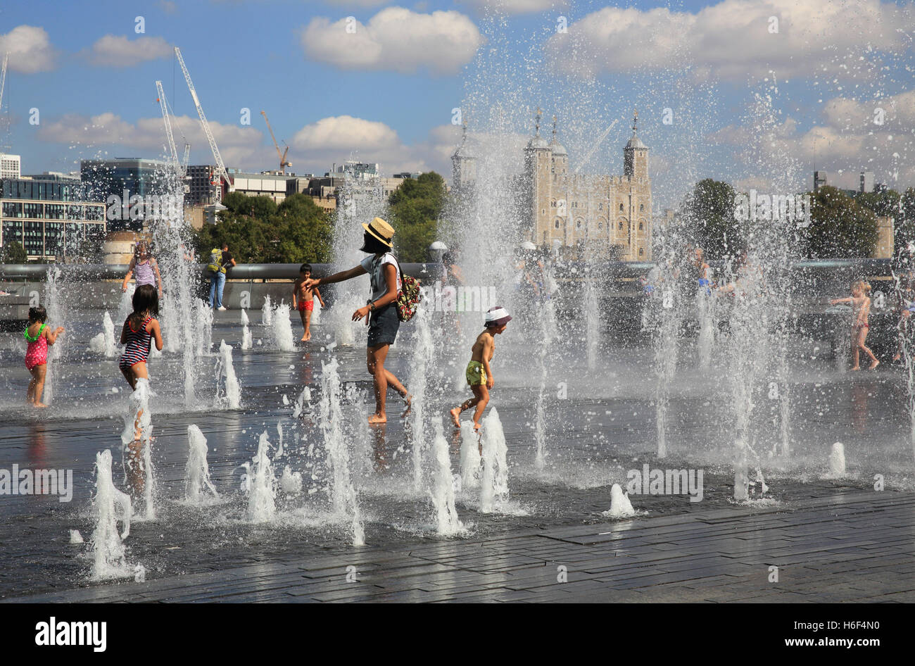 The fountains at More London Riverside, with the Tower of London behind