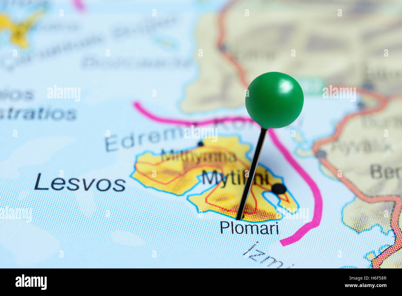 Plomari pinned on a map of Greece Stock Photo