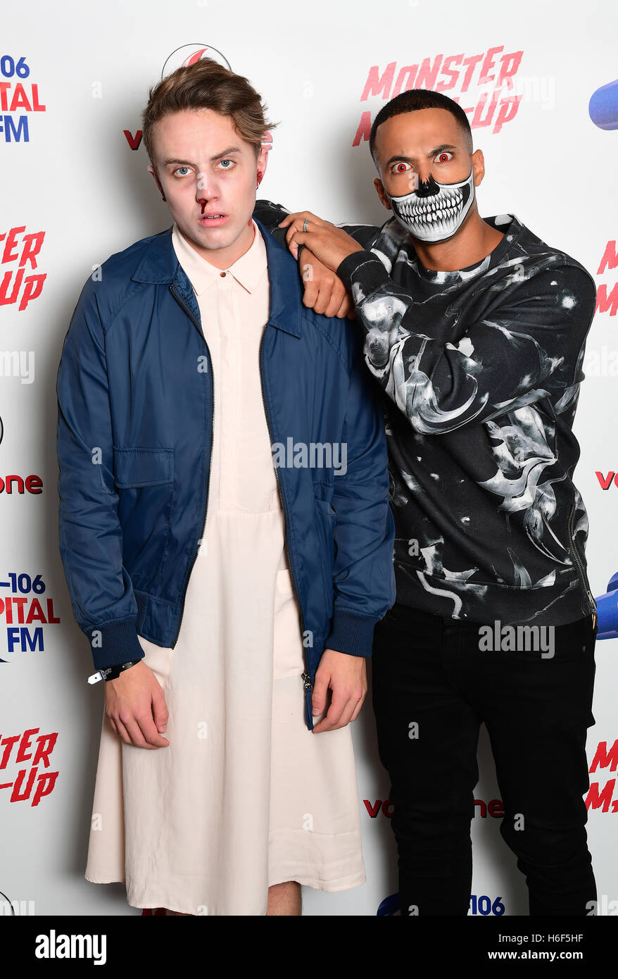 Capital FM's Roman Kemp (left), dressed as Eleven from Stranger Things, and Marvin Humes attending Capital's Monster Mash-Up with Vodafone at the Eventim Apollo in London. Stock Photo