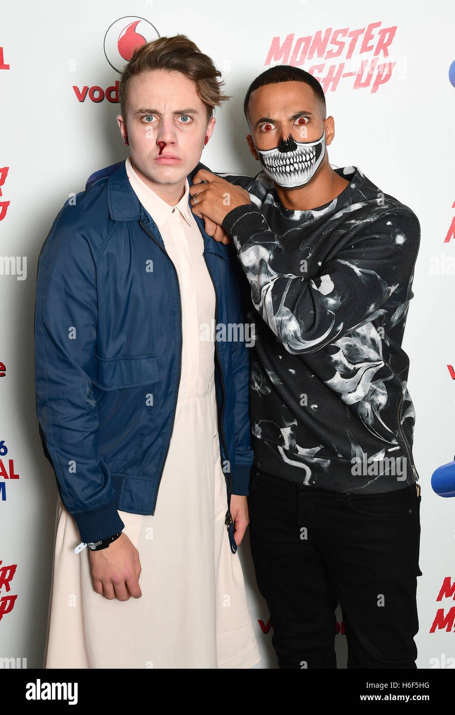 Capital FM's Roman Kemp (left), dressed as Eleven from Stranger Things, and Marvin Humes attending Capital's Monster Mash-Up with Vodafone at the Eventim Apollo in London. Stock Photo