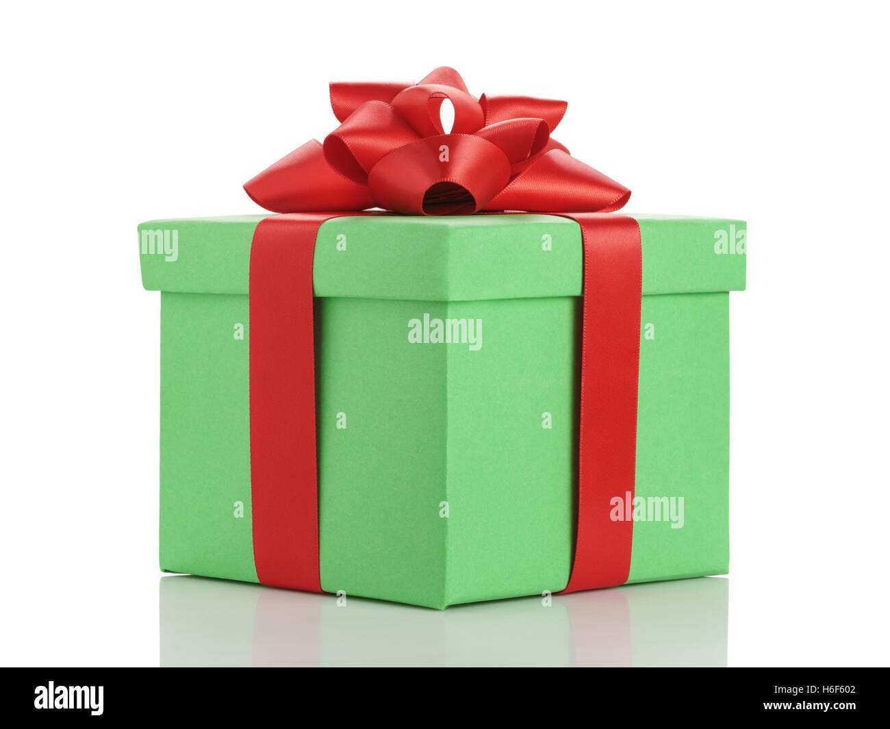 green gift box with red ribbon bow isolated on white Stock Photo - Alamy