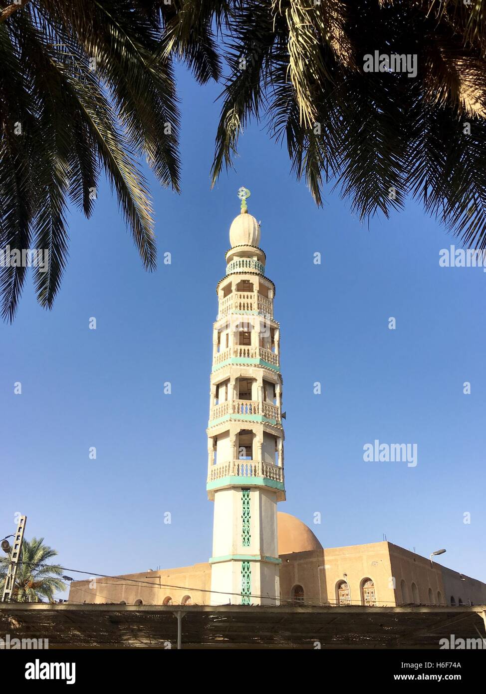 Mosque cote Hotel Tassili ex Transat in Ouargla Algeria. Mosque has one minaret and one of several mosque in Ouargla. Stock Photo