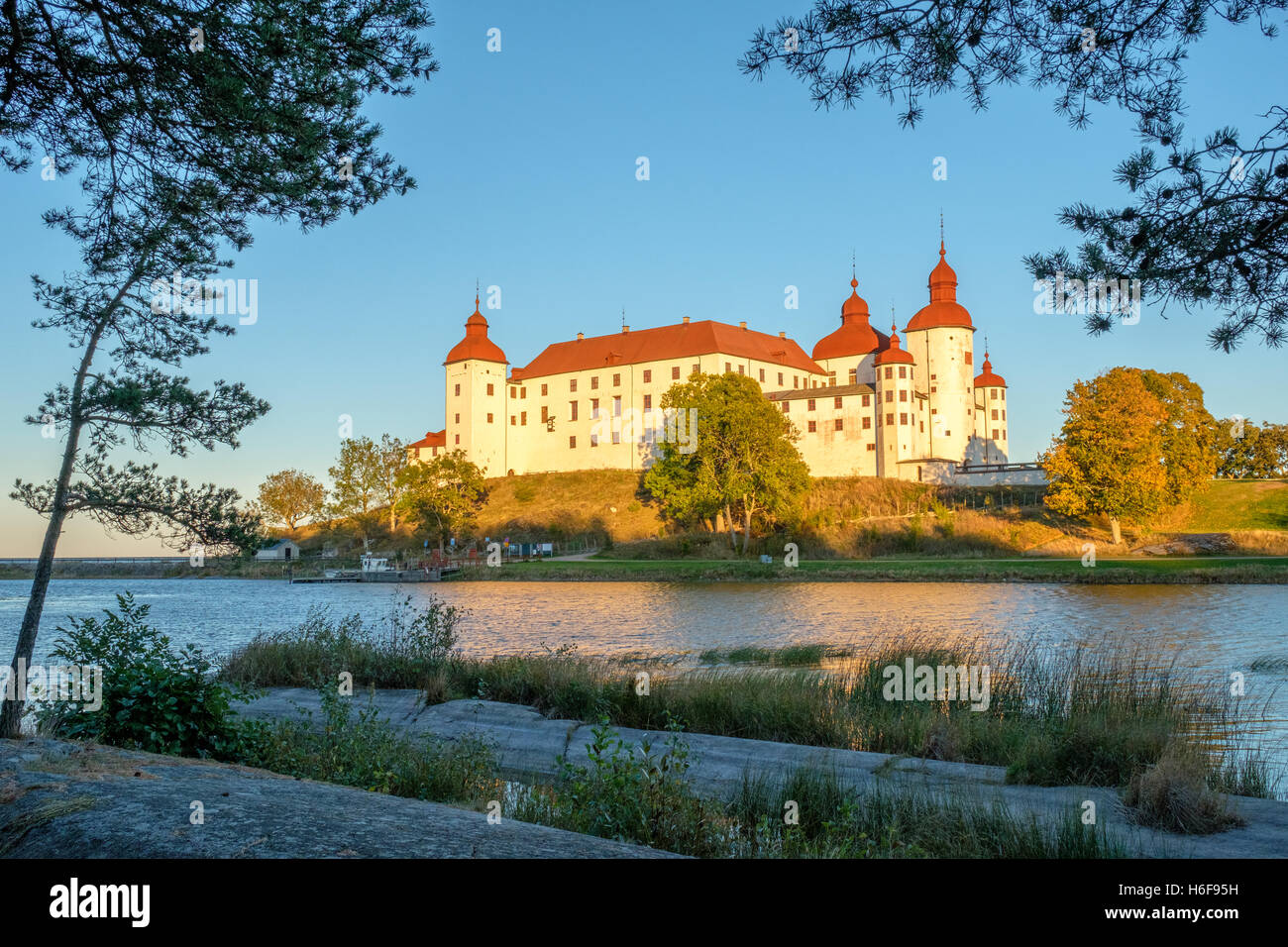 Autumn sunset at Lake Vänern and Läckö Castle Stock Photo - Alamy