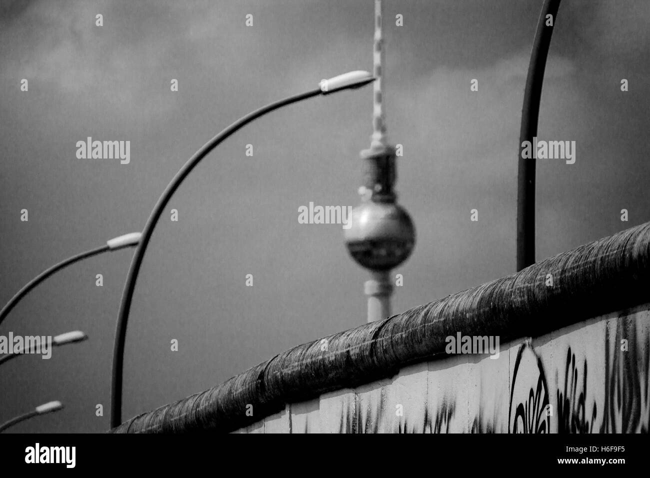 Berlin Wall and Fernsehturm TV Tower Black & white  Berlin Germany Stock Photo