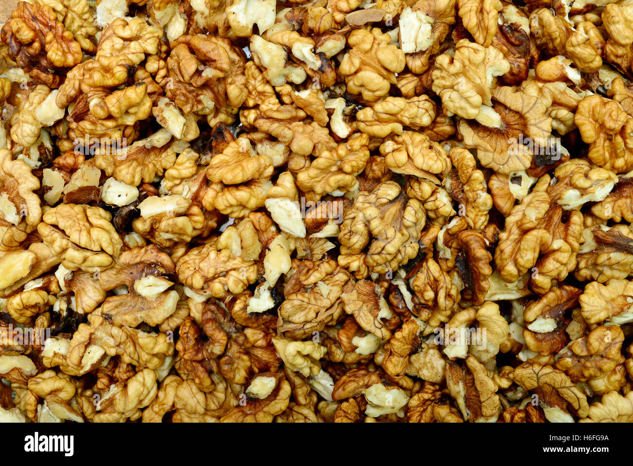 dry walnuts seeds texture pattern food background Stock Photo - Alamy