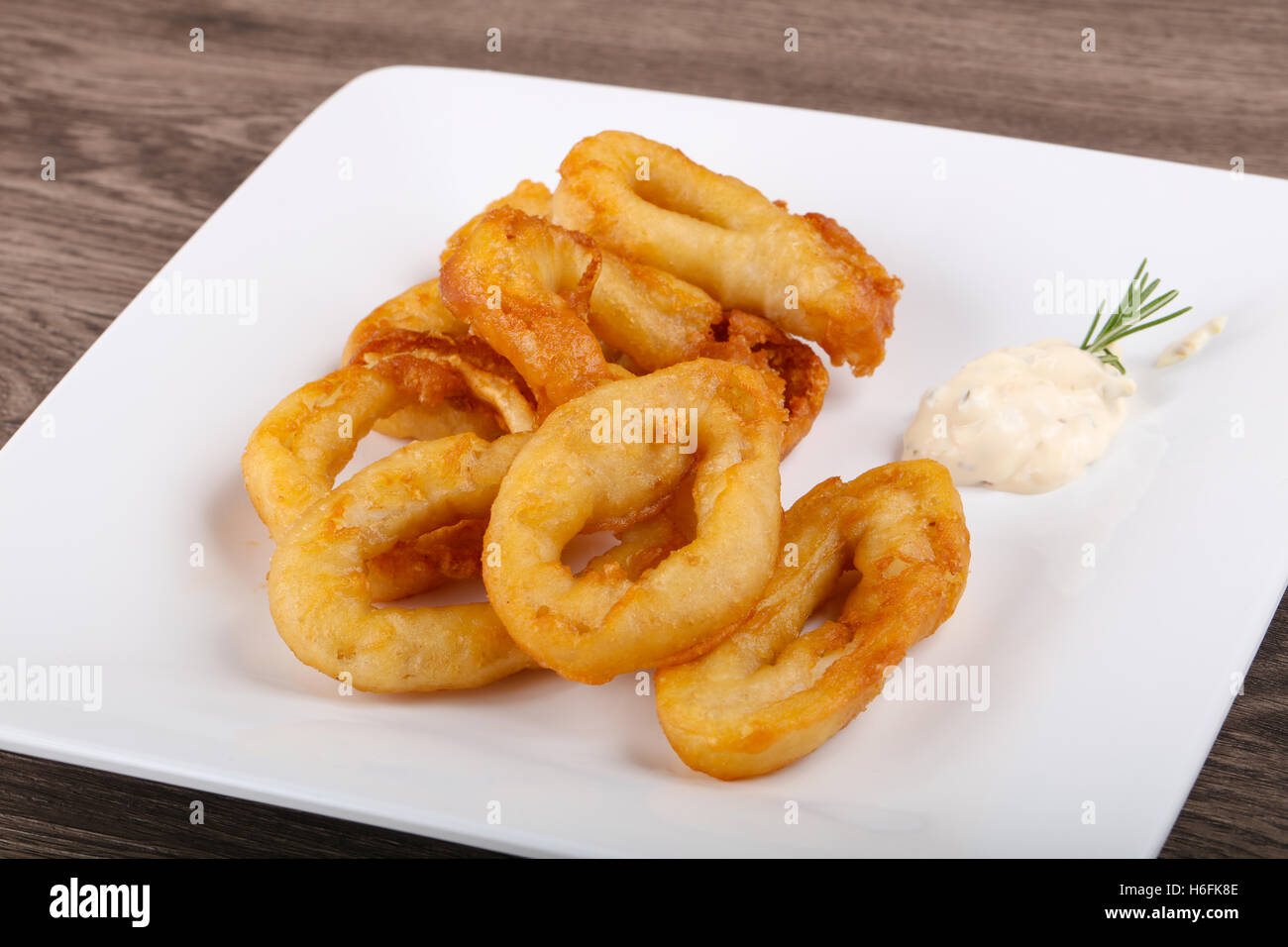 Hot crispy Squid tempura with garlic sauce Stock Photo Alamy