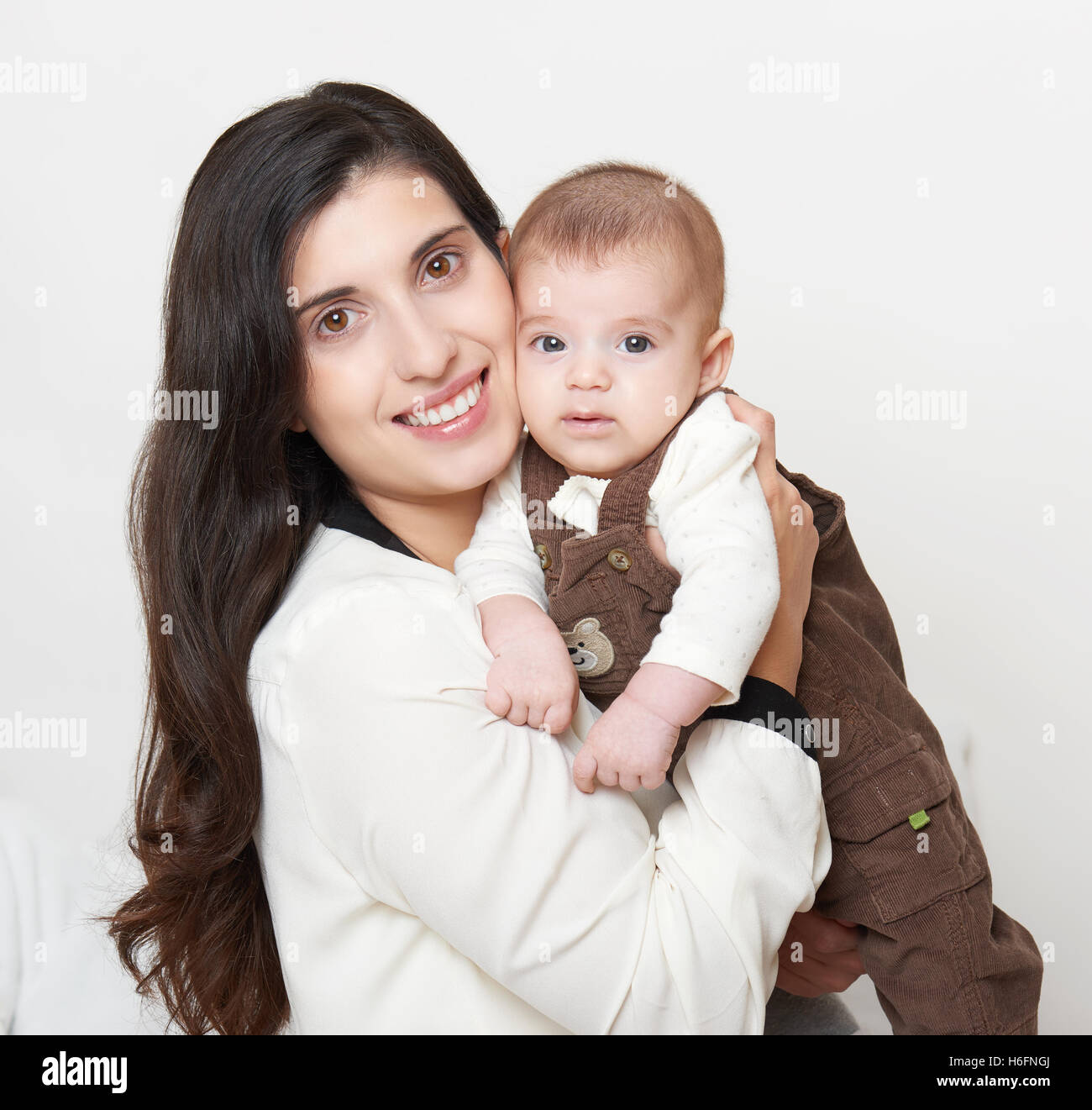Mother And Baby Happy Family Portrait On White Background Stock Photo Mother And Baby Happy Family Portrait On White Background Stock Photo