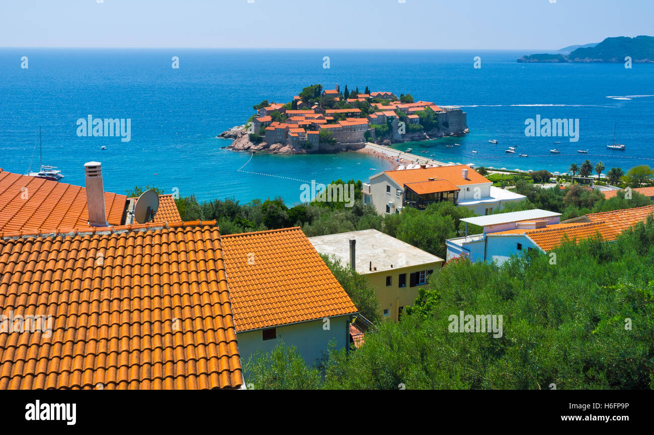The view on the Sveti Stefan islet, that is the most beautiful resort of the Budva riviera, Montenegro. Stock Photo