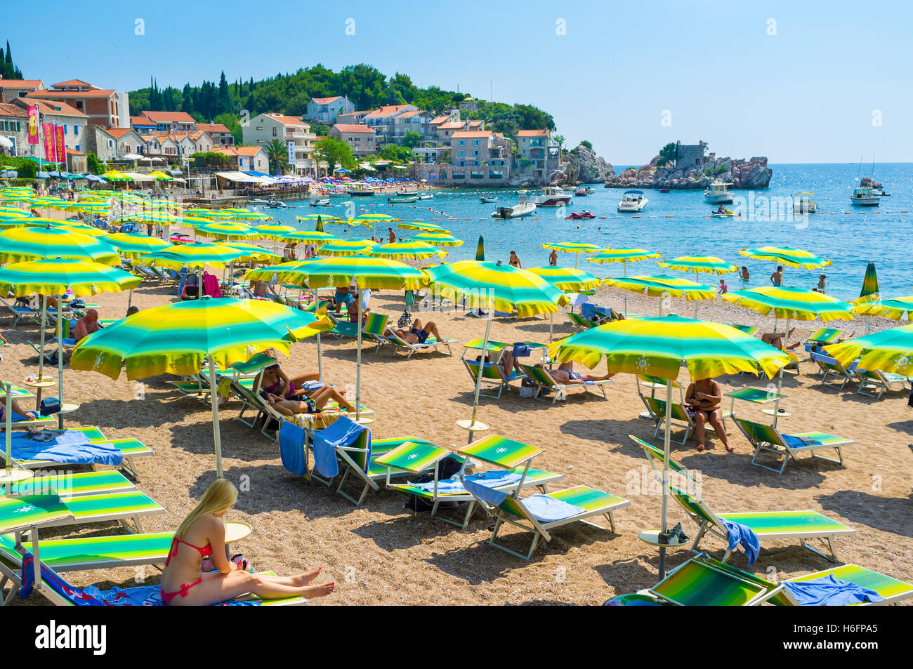 The medieval fishing village boasts the long sand coastline, that is the best place for relax, Sveti Stefan Montenegro Stock Photo