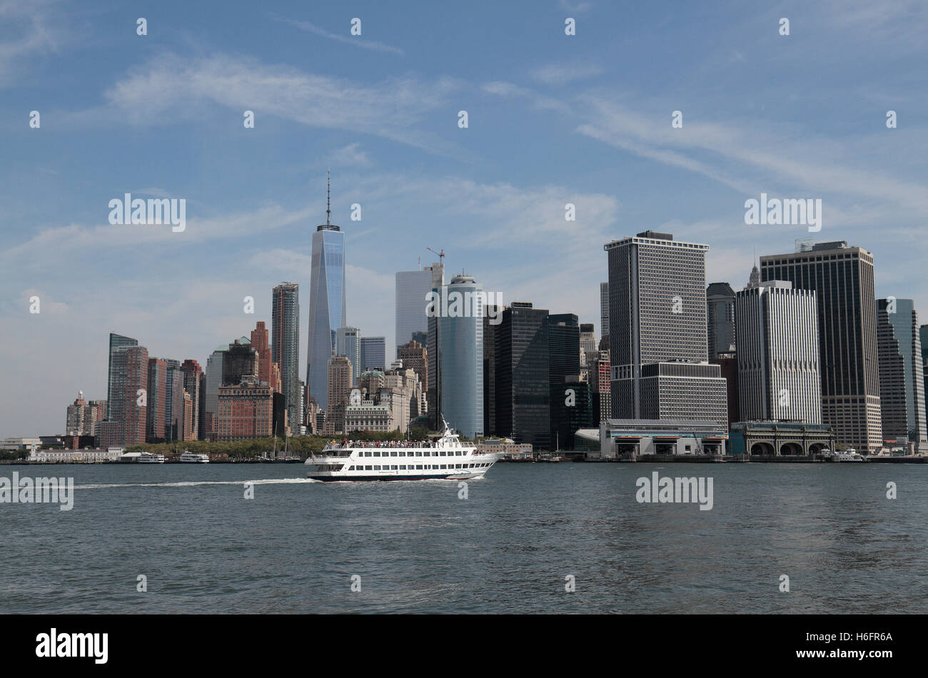 The Hornblower Serenity cruise boat in front of the Lower Manhattan