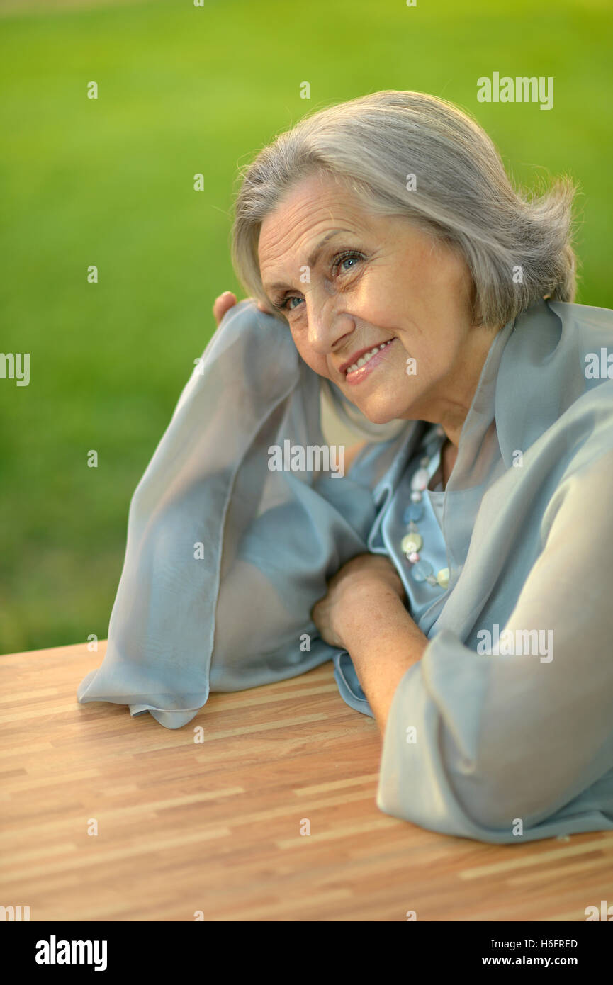 senior woman in summer park Stock Photo