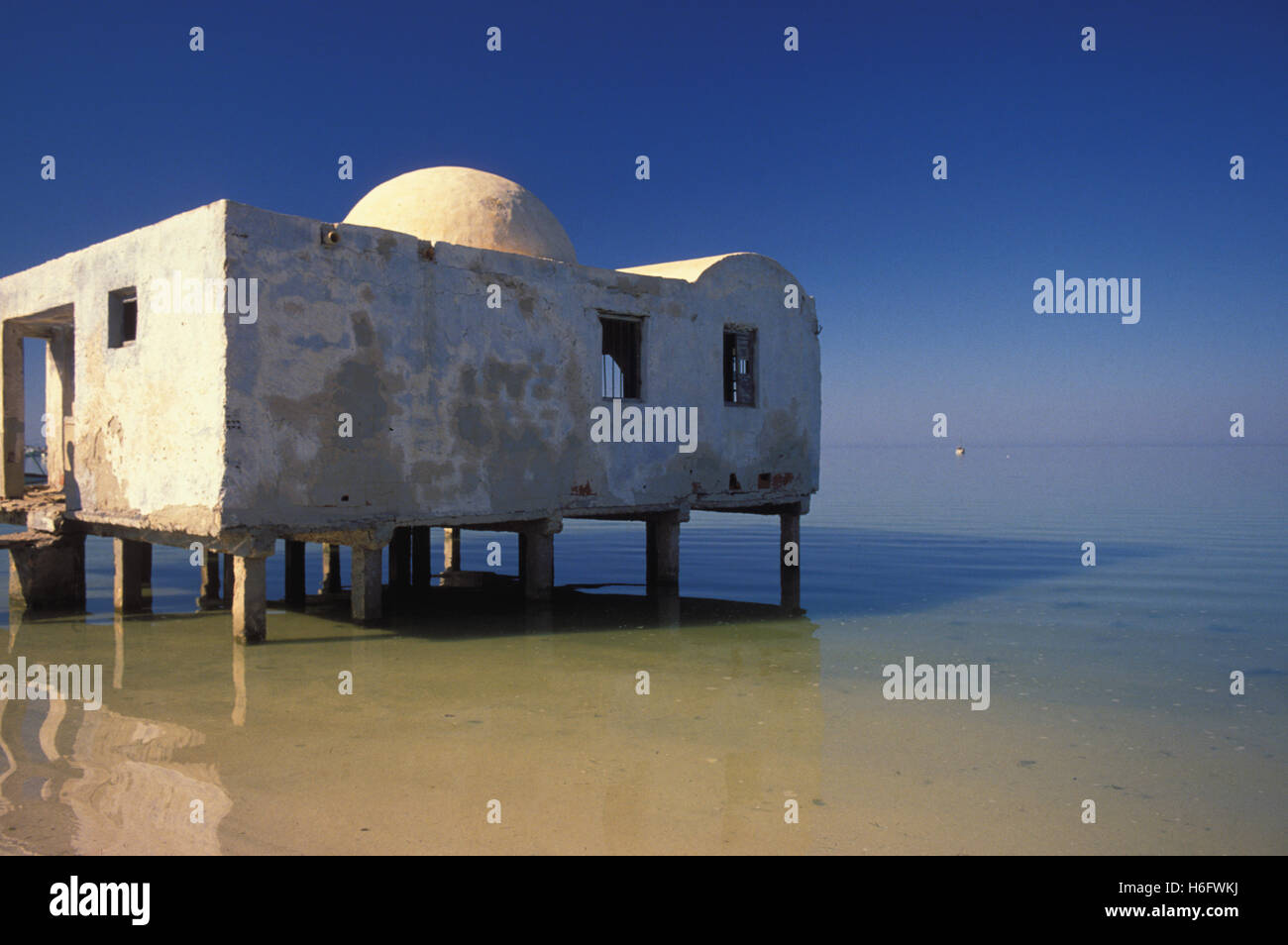 Tunisia, Jarbah Island, old warehouse at the harbour in Houmt Souk. Stock Photo