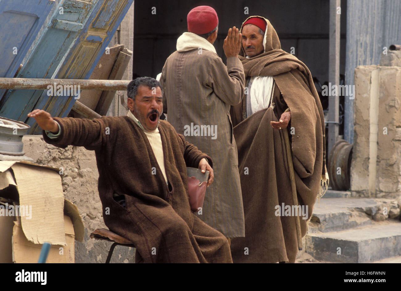 Tunisia, Jarbah Island, men on the market in Houmt Souk. Stock Photo