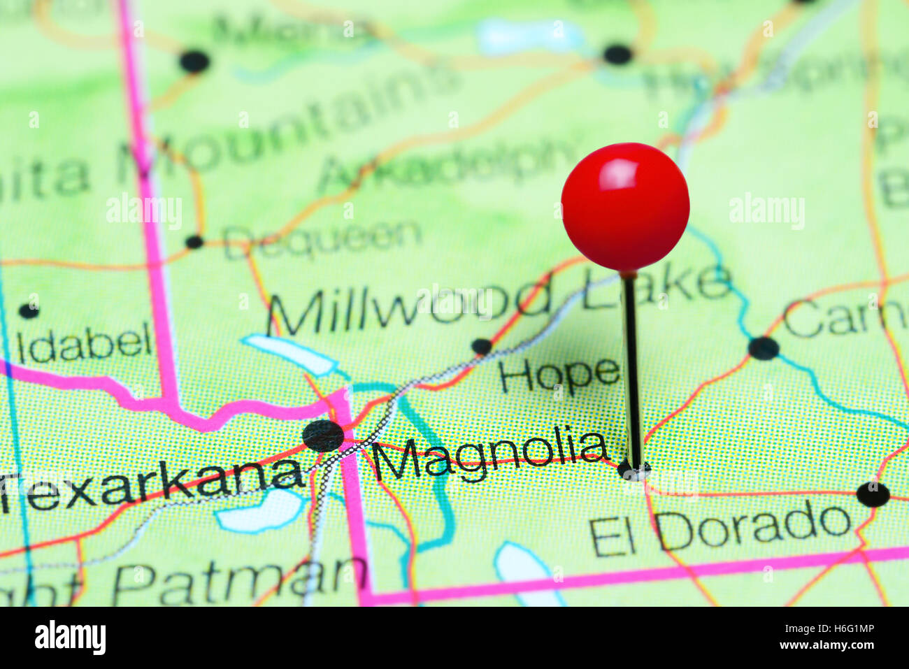 Magnolia pinned on a map of Arkansas, USA Stock Photo