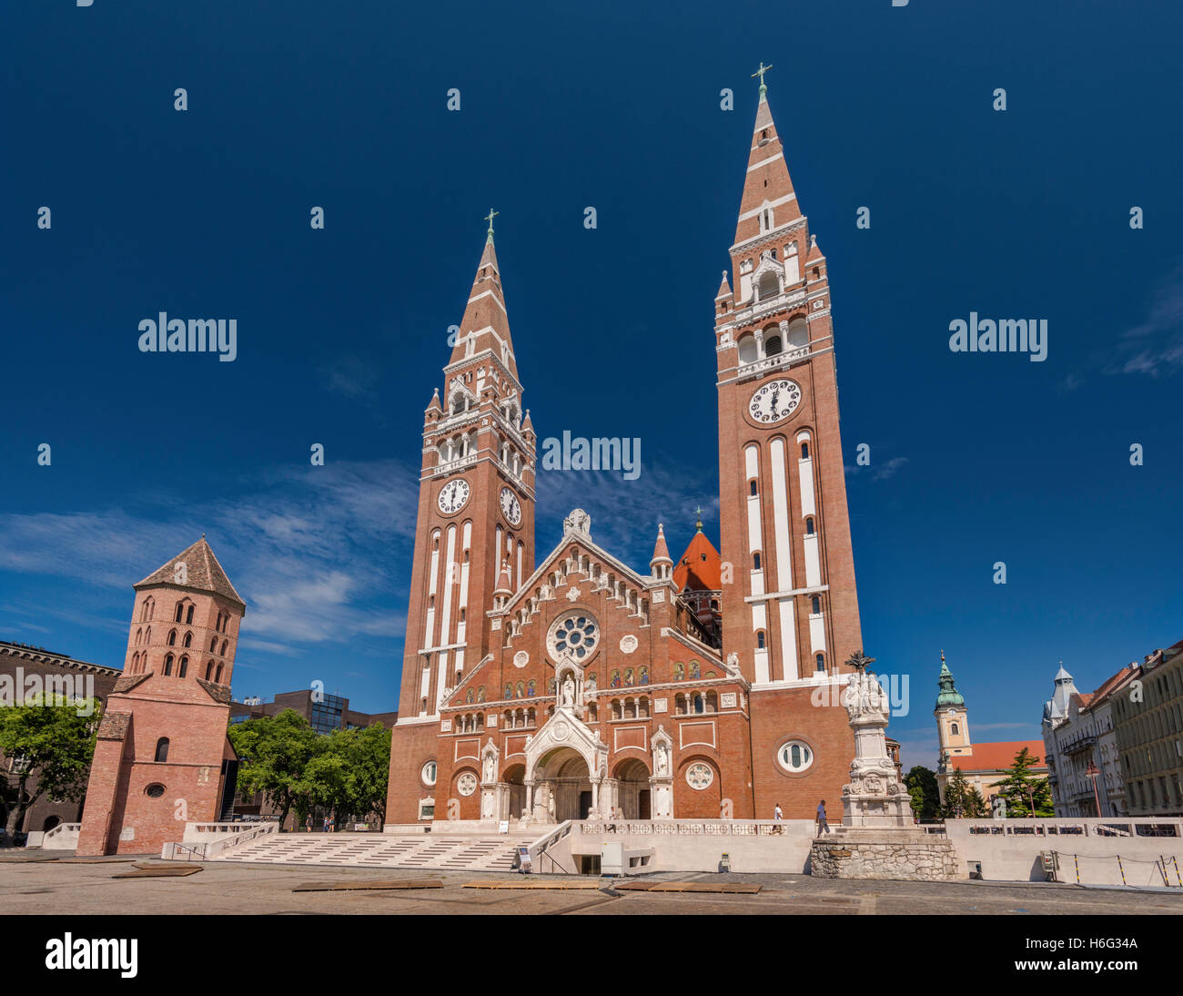 Cathedral, 1930, neo-Romanesque style, Saint Demetrius Tower, 12th century, Romanesque style, in Szeged, Hungary Stock Photo