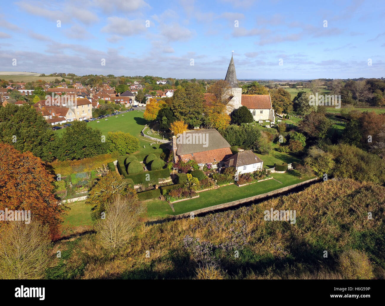 Aerial view of Alfriston Chucrh (St Andrews) and the NT Clergy House (the first property owned by the National Trust) Stock Photo