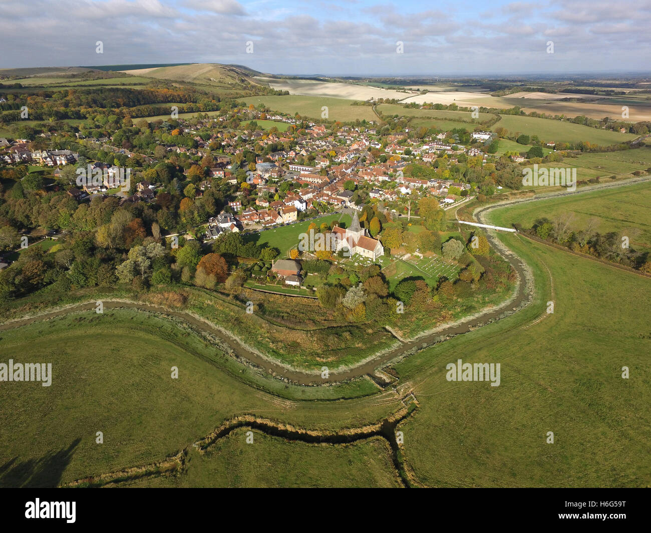 Aerial view of Alfriston Village, East Sussex, and the Cuckmere River winding through the South Downs National Park, Stock Photo