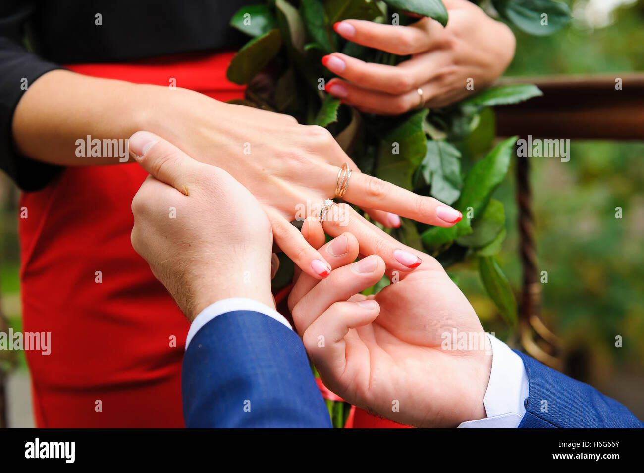 Young man propose to his girlfriend. Ring closeup Stock Photo Alamy