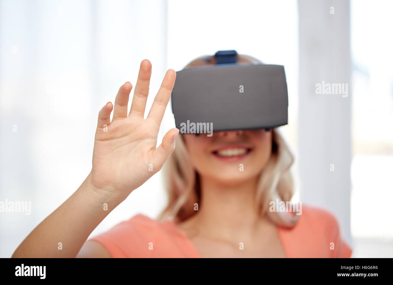 woman in virtual reality headset or 3d glasses Stock Photo Alamy