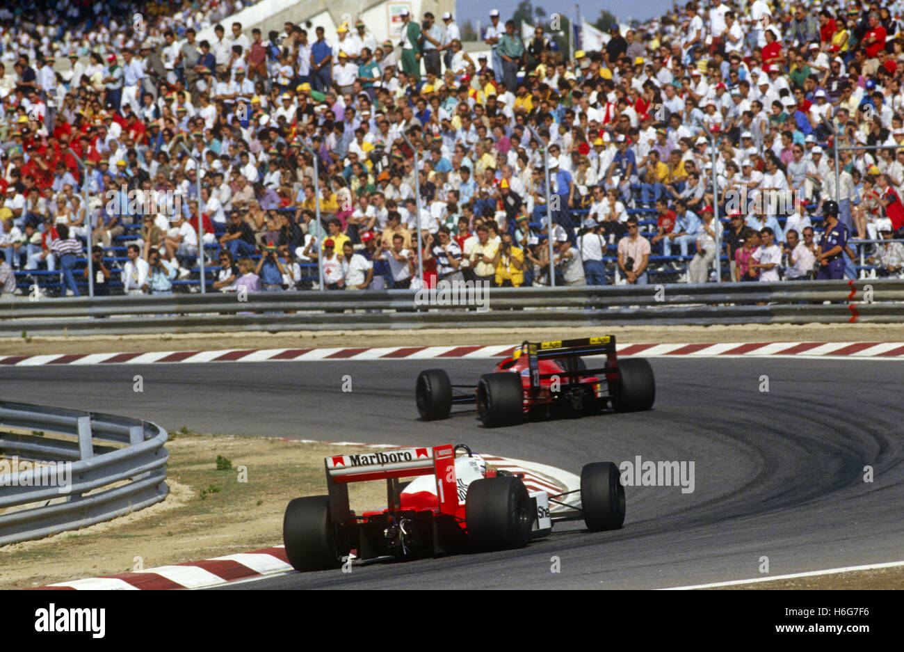 McLaren chasing Ferrari - Brazilian GP, Rio de Janeiro - 1981-82 Stock Photo