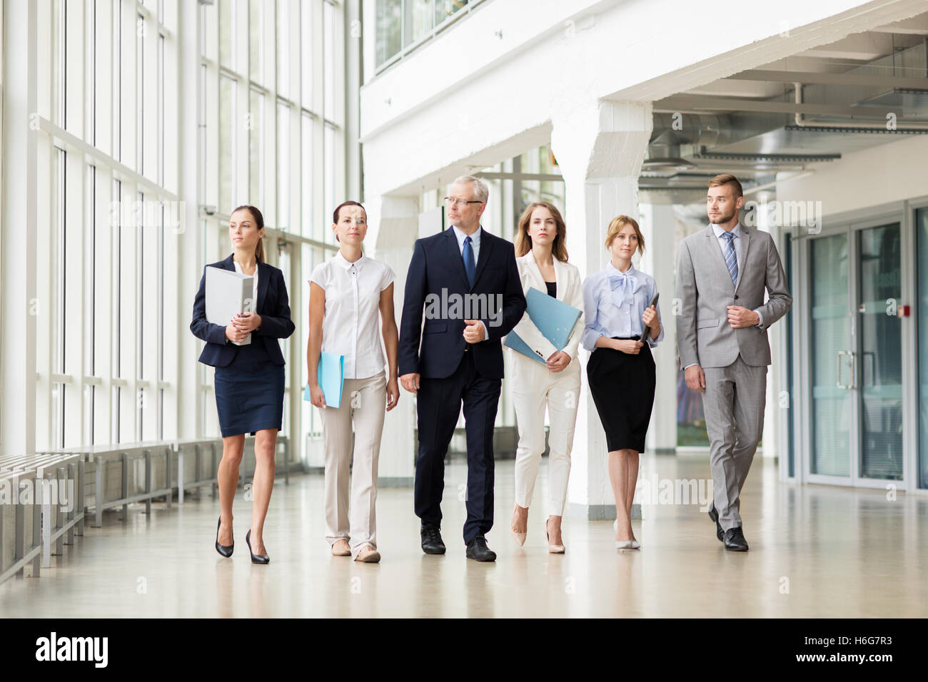 Business people walking hi-res stock photography and images - Alamy