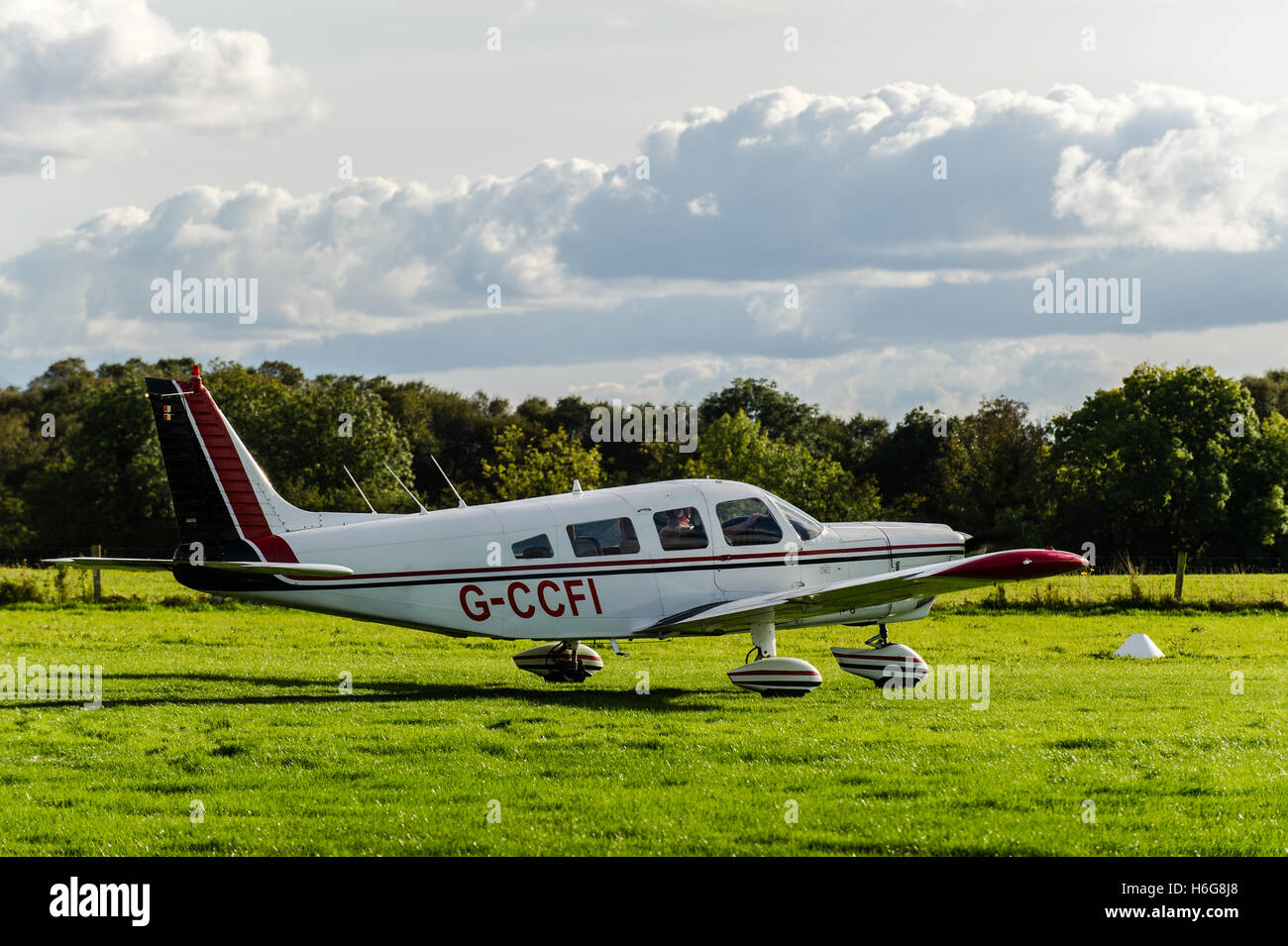 1973 Piper PA-32-260 Cherokee Six Aircraft taking off from an airfield in Co. Offaly, Ireland. Stock Photo