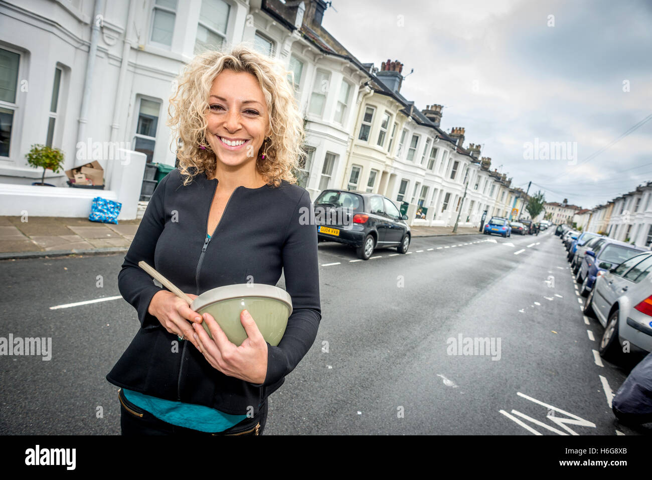 One-time Great British Bake-Off contestant Kate Henry at home in Brighton Stock Photo