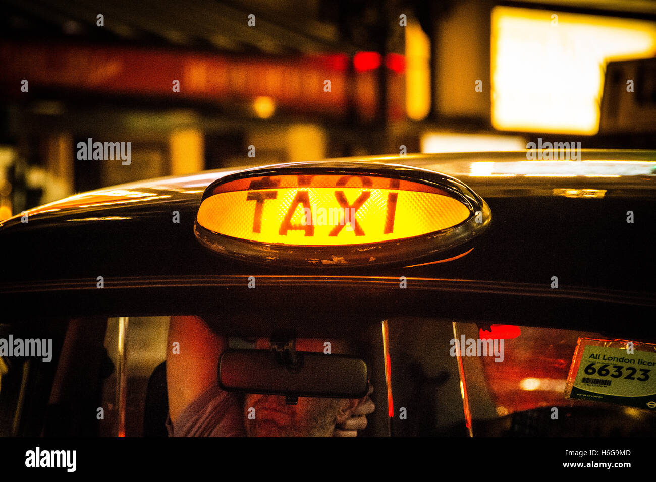 Black taxi cab sign in Soho, Central London, UK Stock Photo