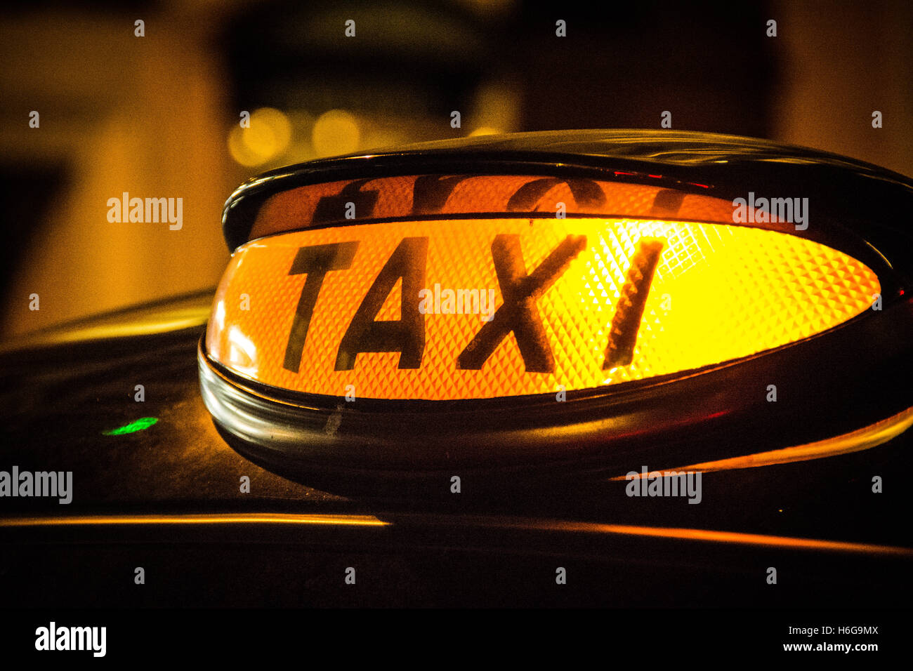Closeup of the iconic For-Hire Black taxi cab sign in Soho, Central London, UK Stock Photo