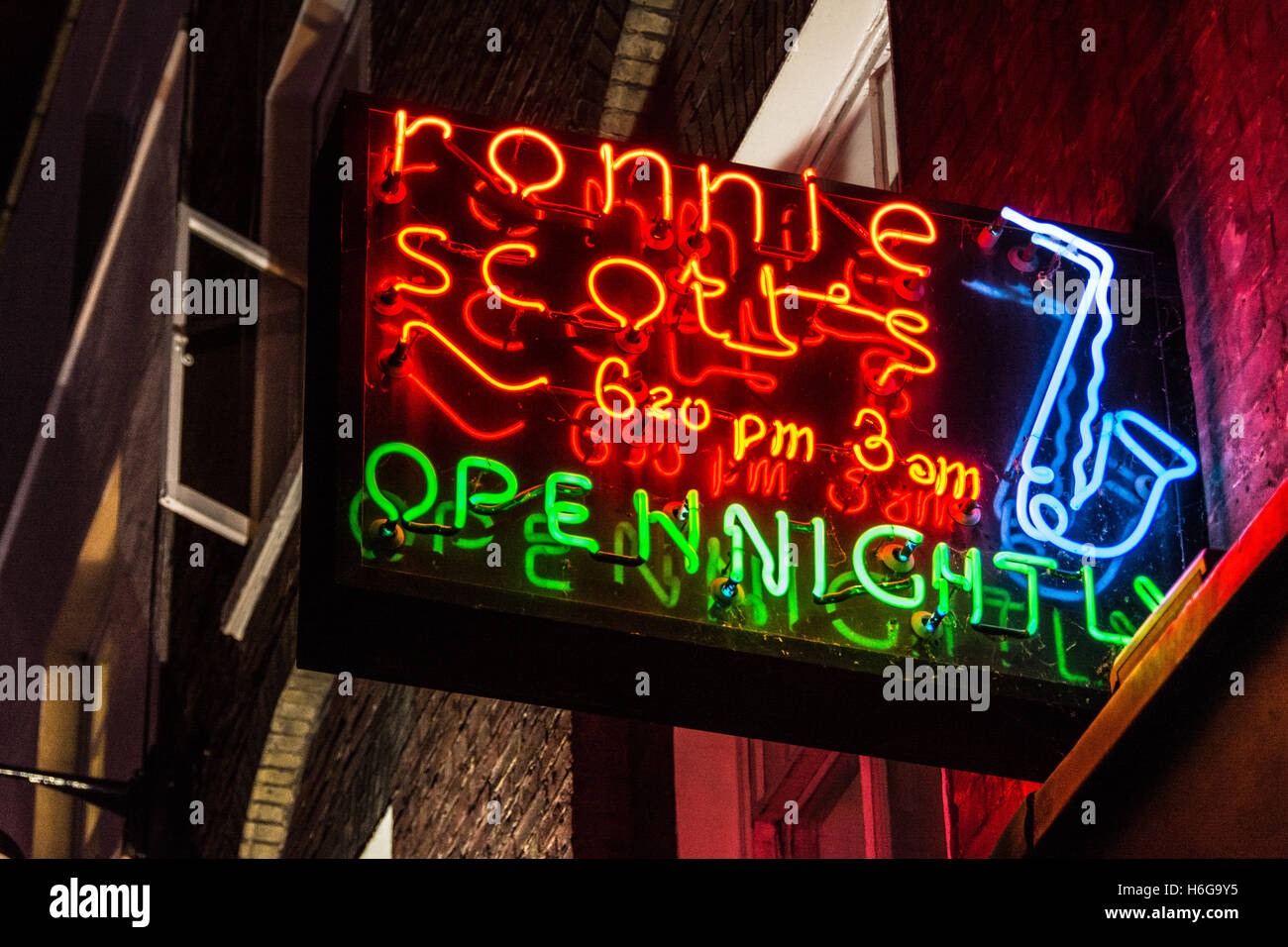 Night-time view of Ronnie Scott's Jazz Club neon signage in Soho, London, UK, Europe Stock Photo