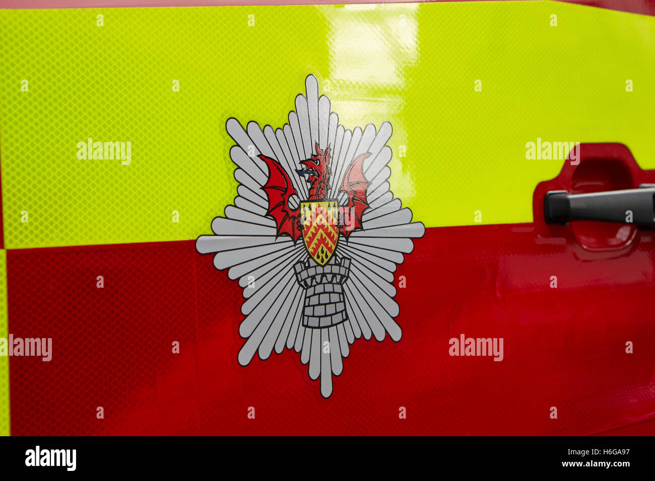 south wales fire service crest logo on fire engine Cardiff Wales United Kingdom Stock Photo