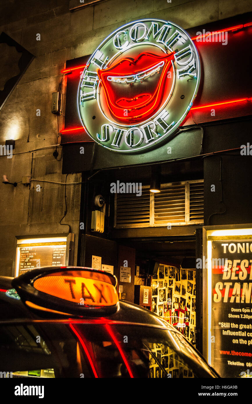 London taxi cab sign outside the Comedy Store in Soho, Central London, UK Stock Photo