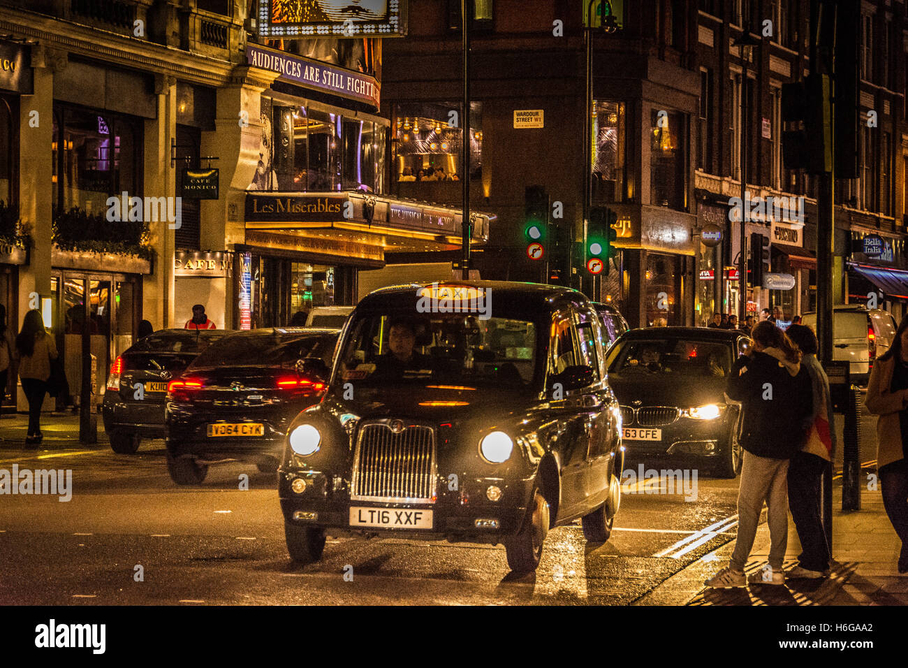 Black taxicab for-hire sign on Shaftesbury Avenue in Chinatown, Soho, Central London, UK Stock Photo