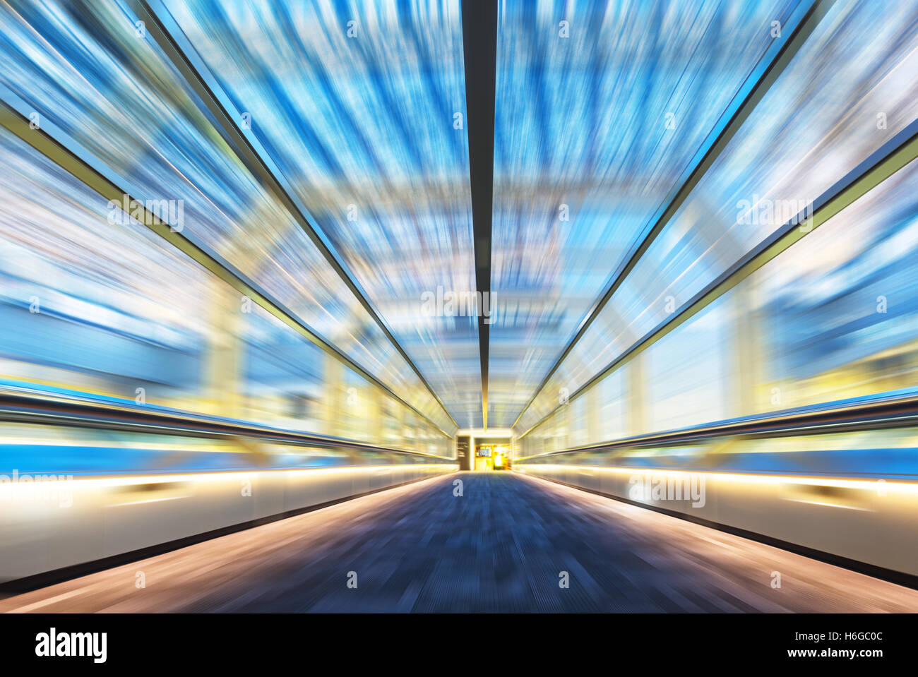 blur motion of empty corridor with abstract glass ceiling in tokyo Stock Photo